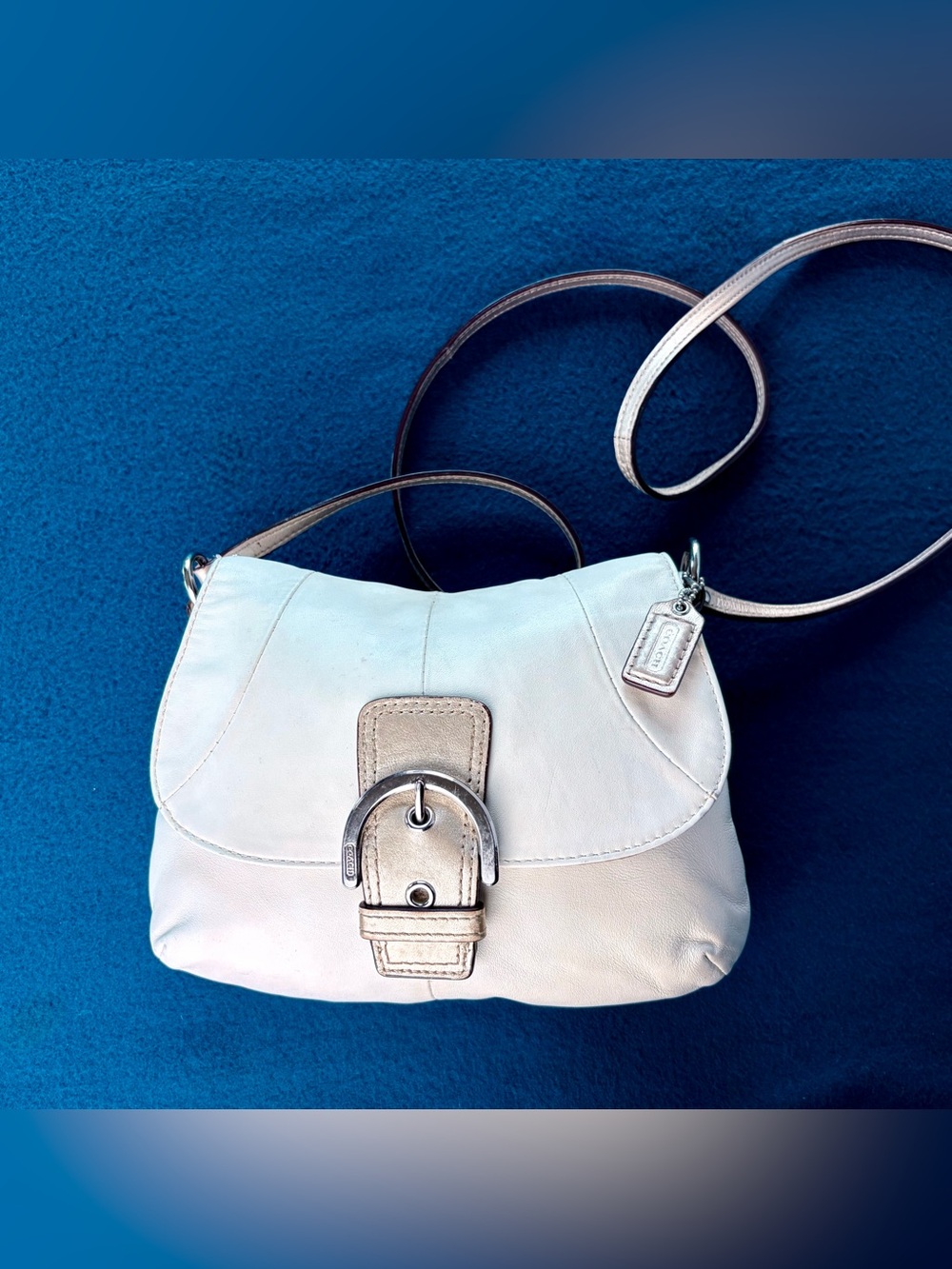 Rare Coach Soho 2010s ivory crossbody bag with gold strap and lilac lining